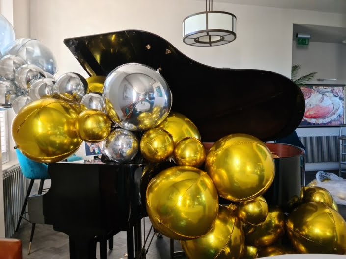 Gold and silver orbs balloon decorations