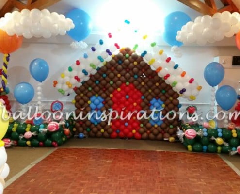 Candy Land themed balloon decorations - Ginger bread house and balloon sweets