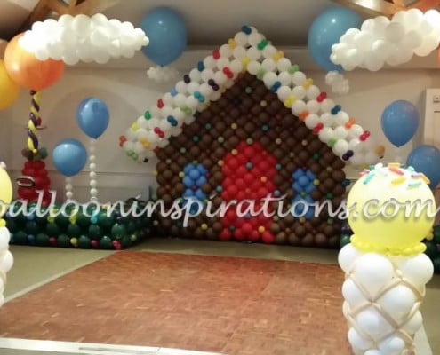 Candy Land themed balloon decorations - Ginger bread house balloon backdrop