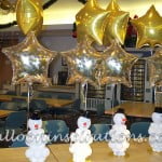 Balloon snowmen as christmas party table decorations